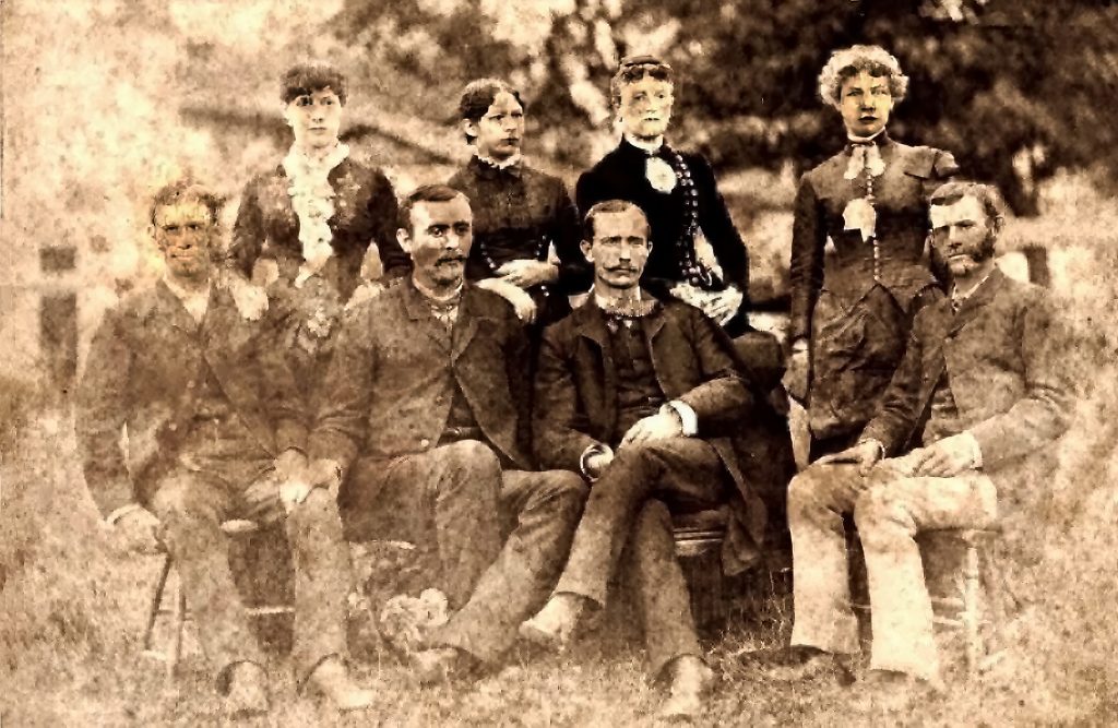 Left to Right: Clay Meal Hill, Mattie Van Cleeve Hill, Richard Tidrick, Elizabeth Arminta Hill Tidrick, George Elzy Hill, Fitzhugh Watkins Hill, Mattie LaMaster Hill, Horace William Hill, probably taken at the funeral of Amanda Walker Hill